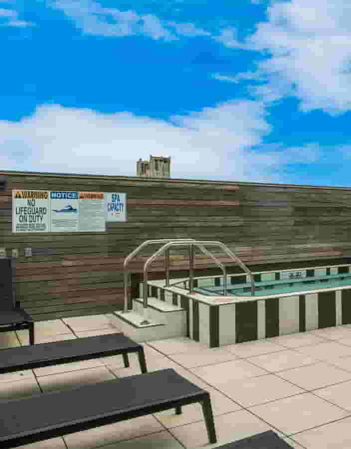 Rooftop hot tub and lounge with views of Downtown Minneapolis