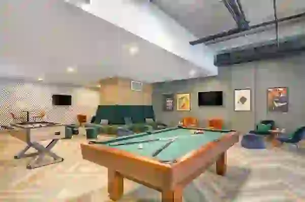 Game Lounge with pool table, foosball, and lounge seating