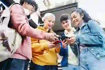 Friends with mobile phones outside The Link Minneapolis