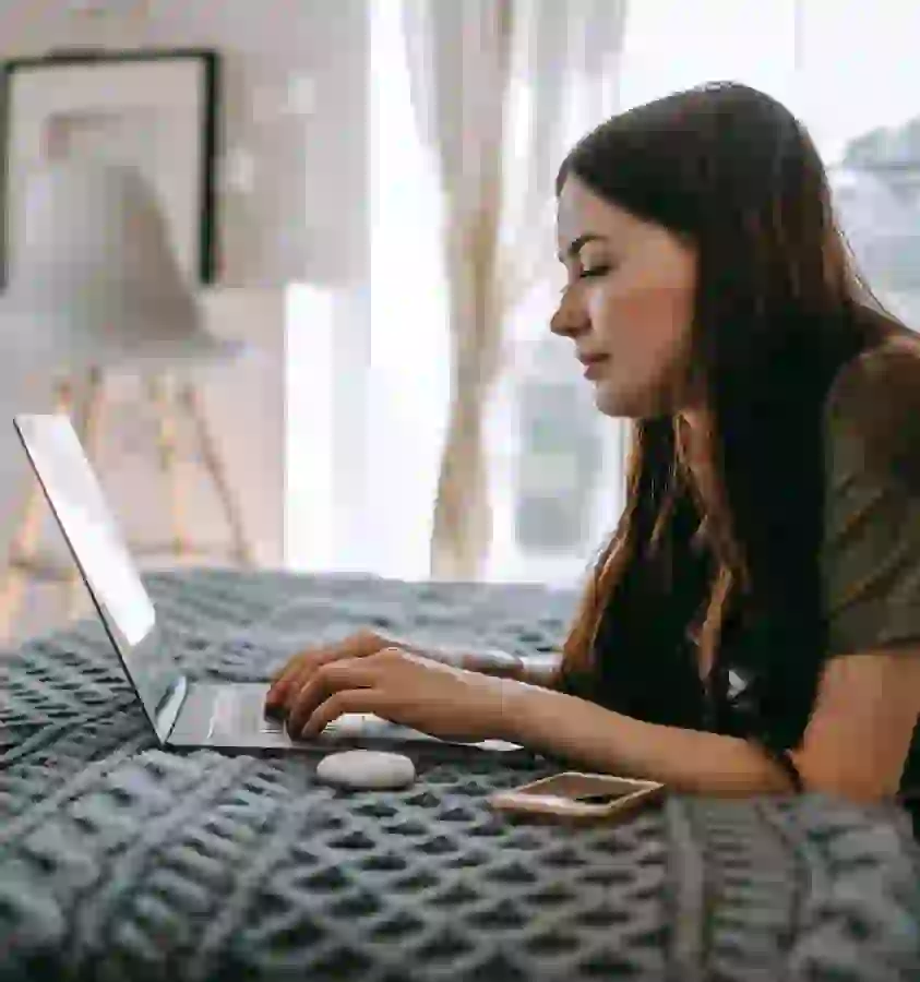 Resident using laptop with included wifi