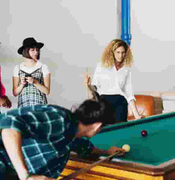 Students playing pool in the Game Room
